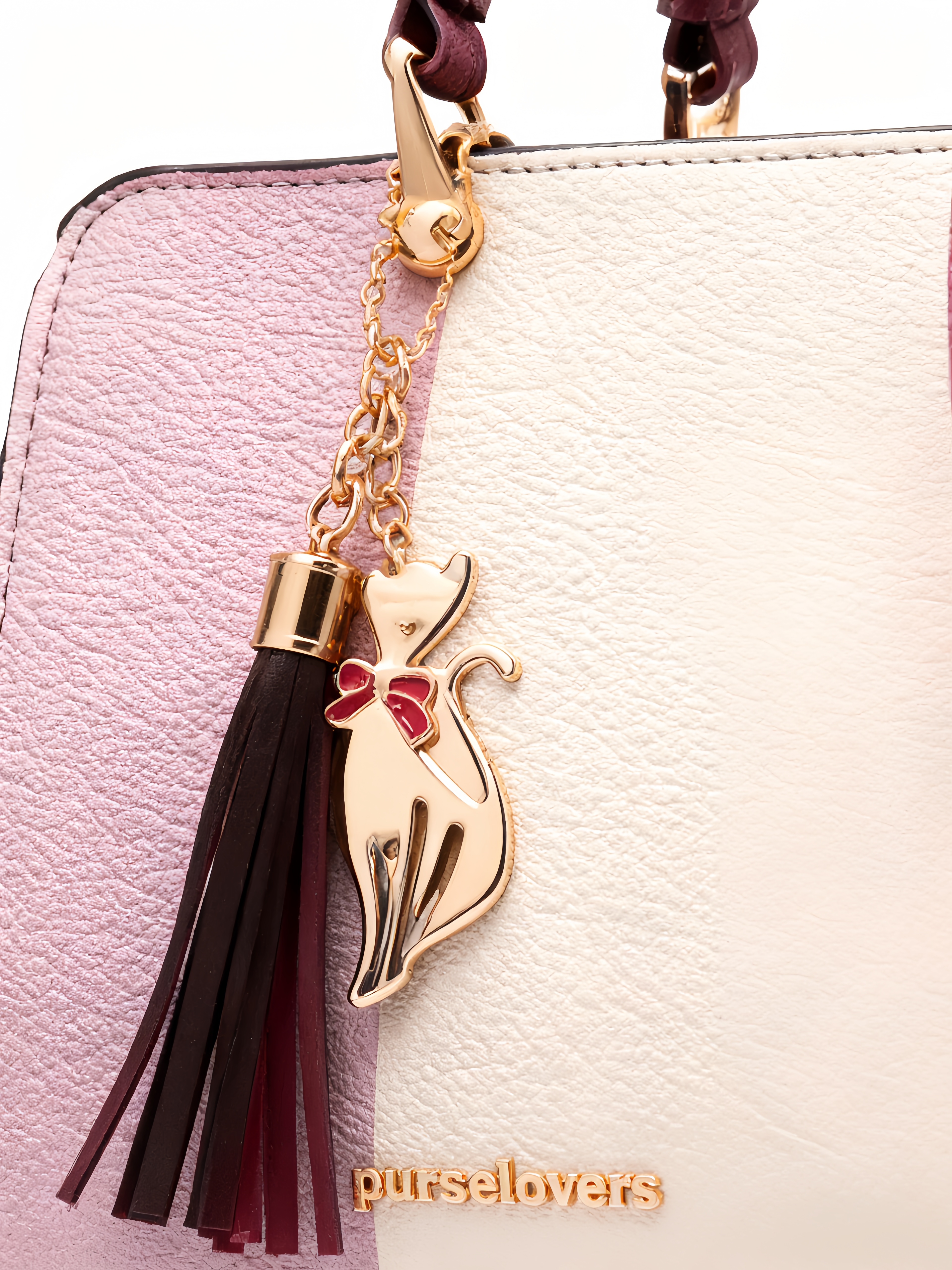Purselovers Pink and White Color-Blocked Tassel Handbag
